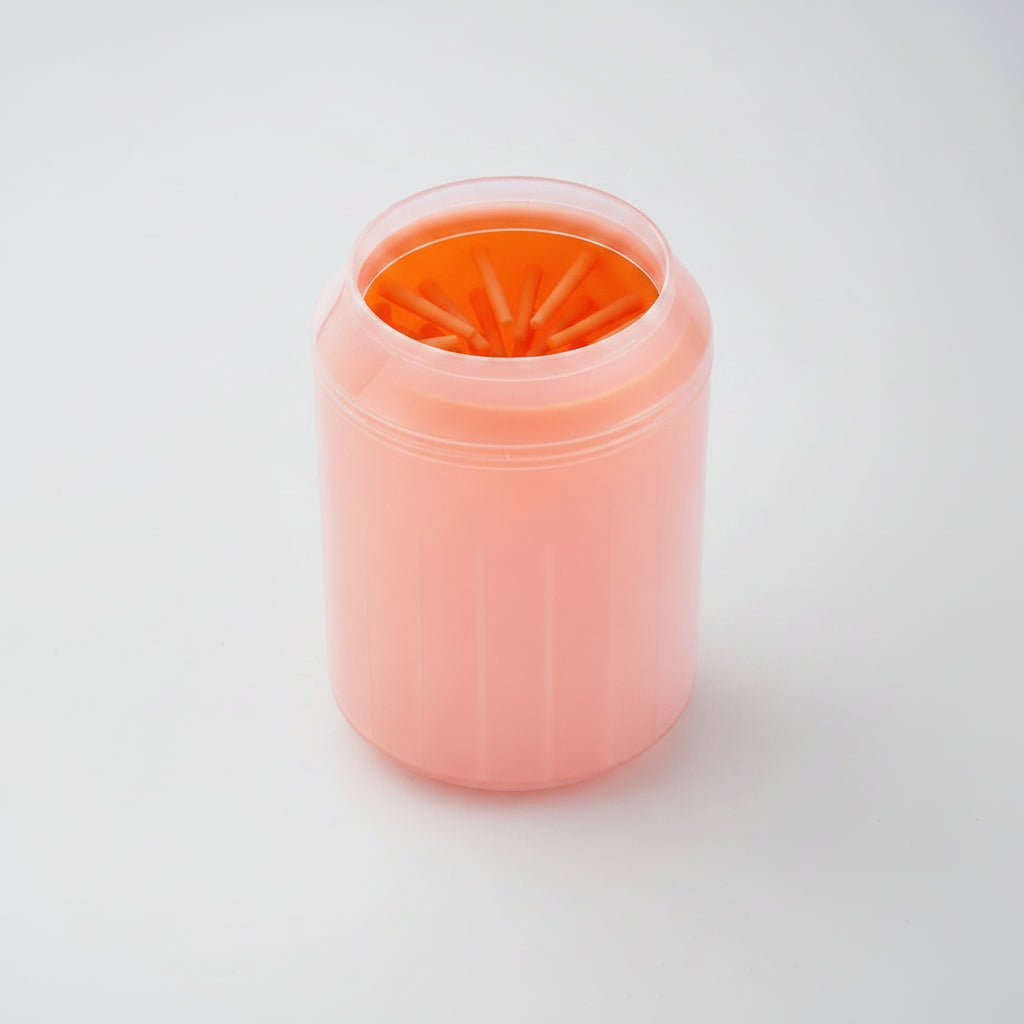 Orange portable pet paw cleaner cup with soft silicone brush